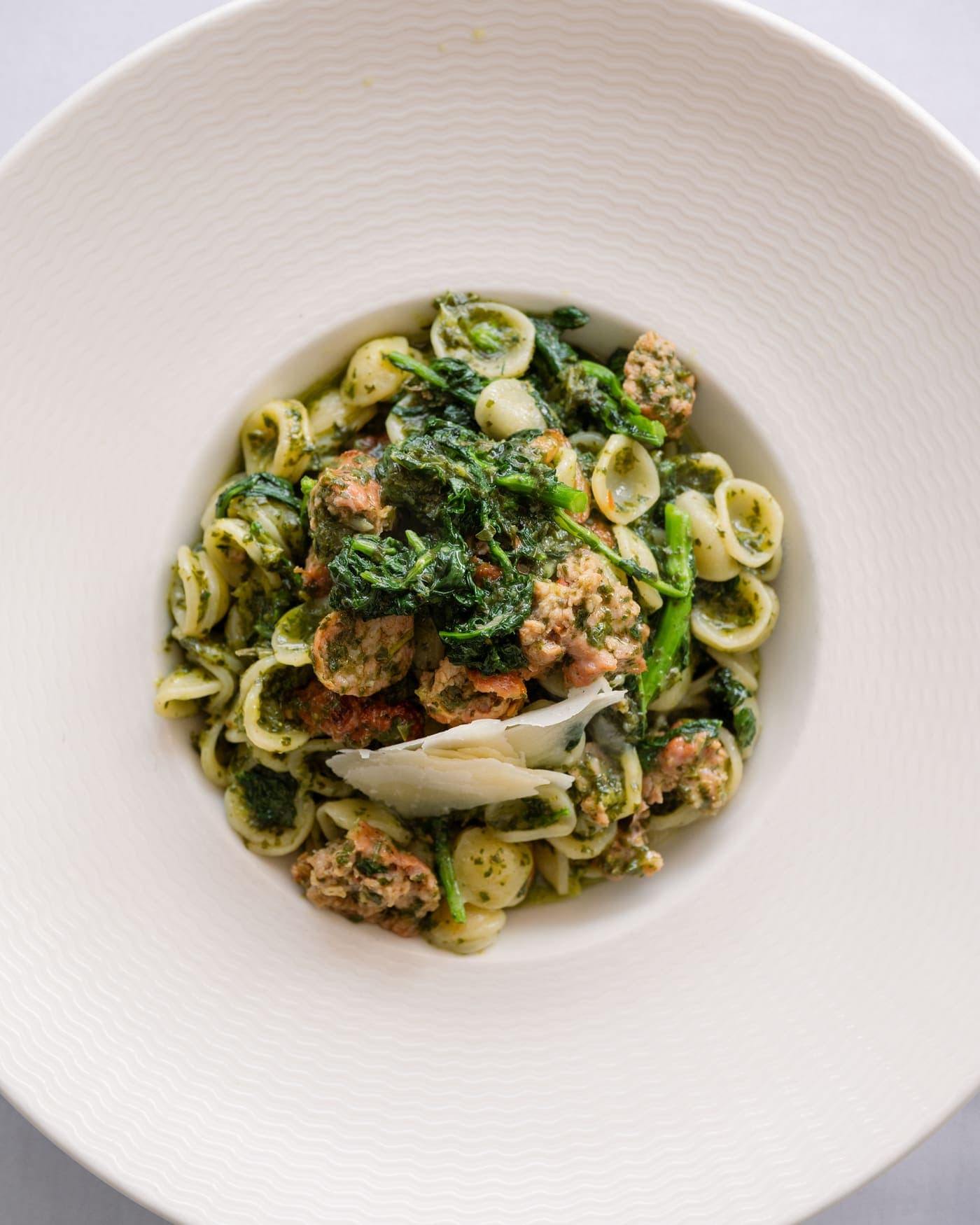 Orecchiette with rapini and sausage, shaved parmesan